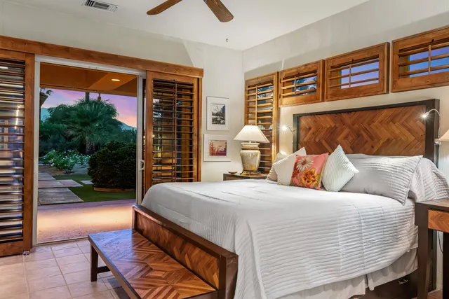 front view of a house with a garden