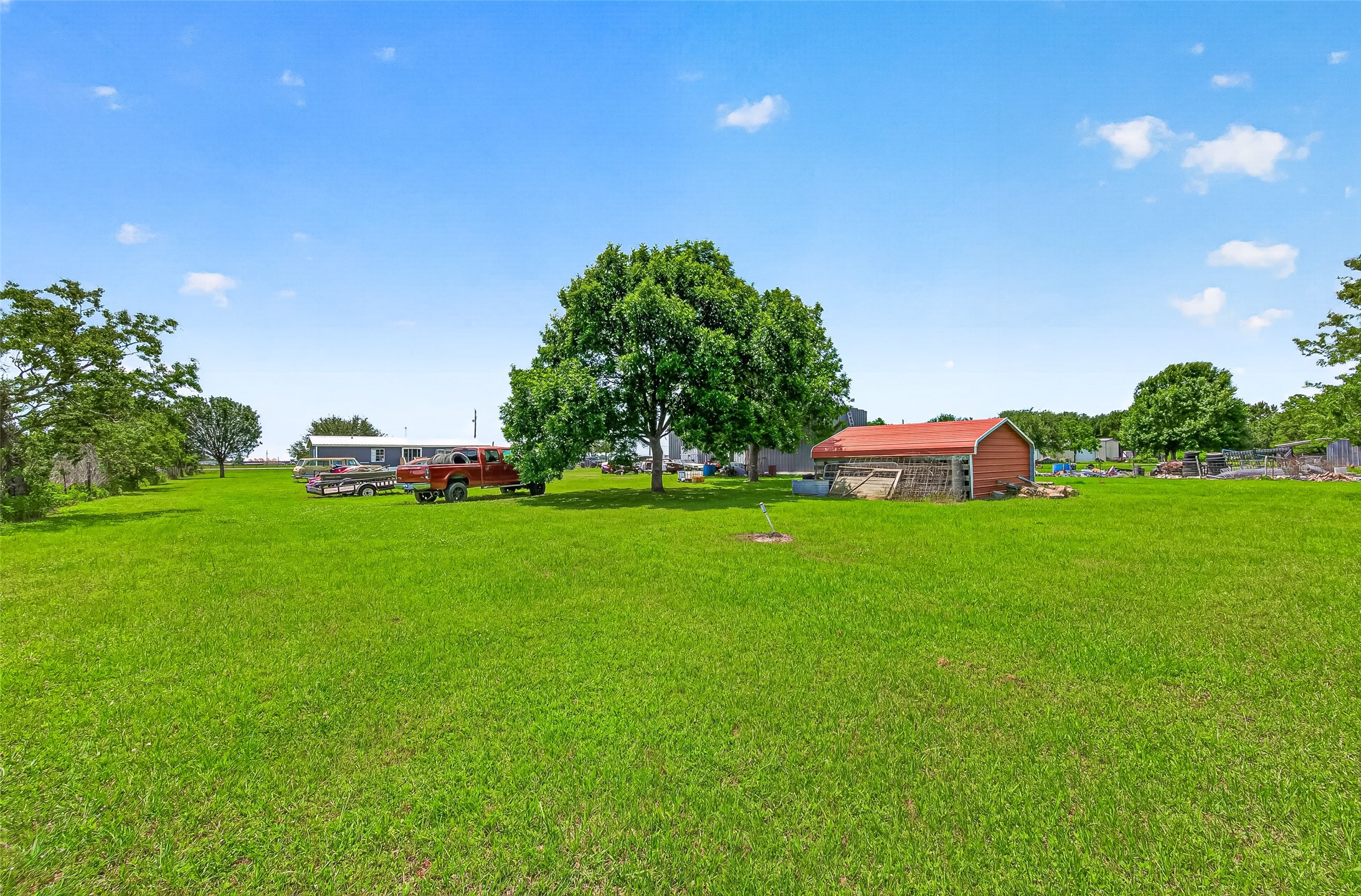 9062 Drachenberg Road Beasley, TX 77417 - Photo 7 of 7 a front view of a house with garden