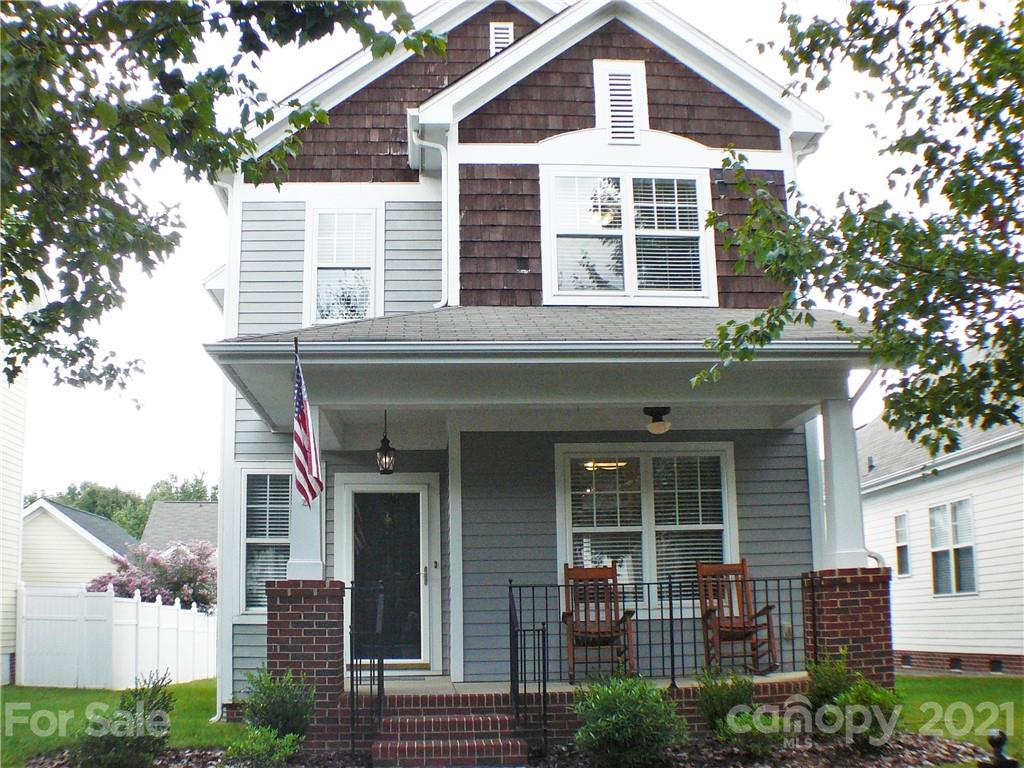 8111 Townley Road Huntersville, NC 28078 - Photo 1 of 27 a front view of a house with a yard