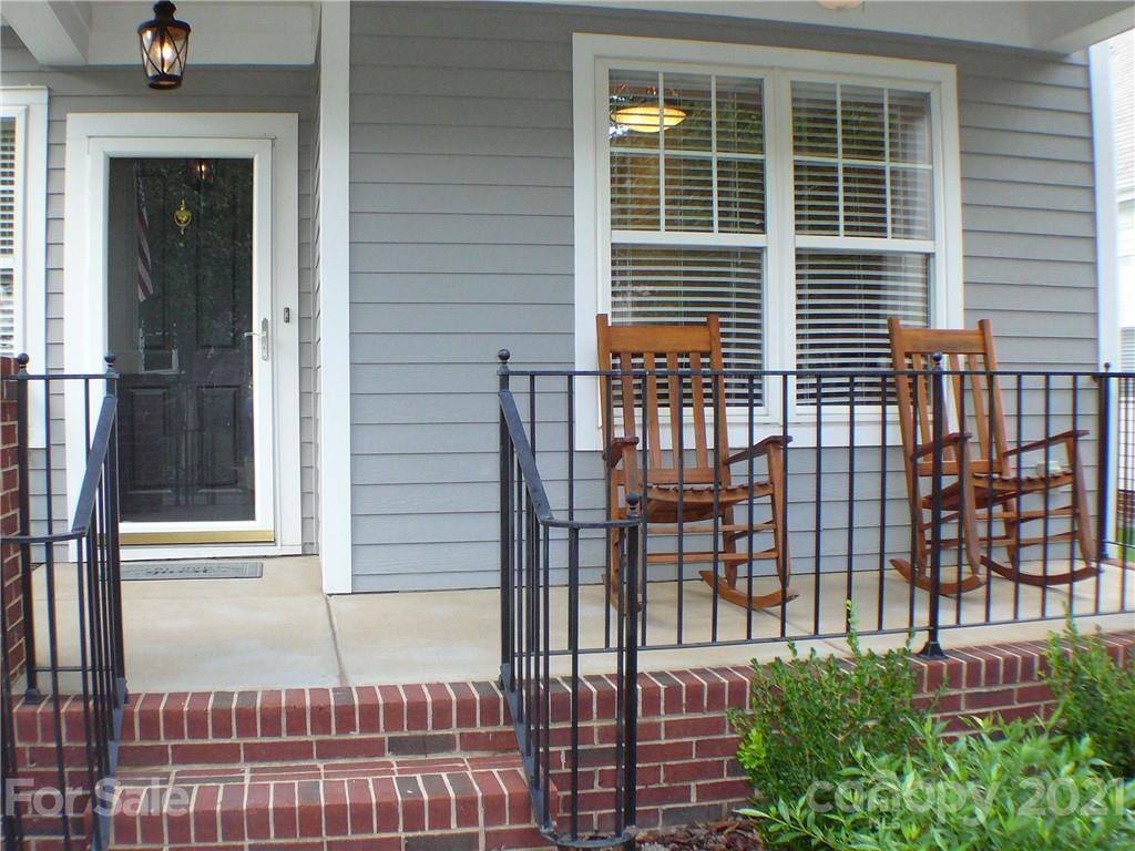 8111 Townley Road Huntersville, NC 28078 - Photo 2 of 27 a view of a balcony and window