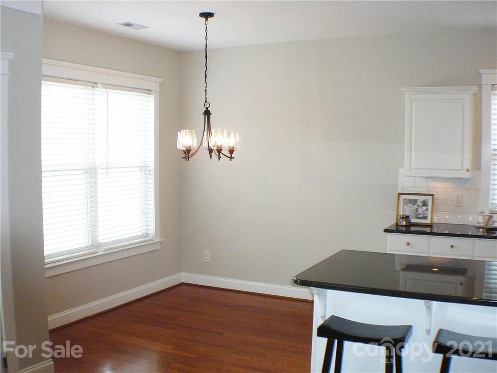 8111 Townley Road Huntersville, NC 28078 - Photo 12 of 27 a workspace with furniture and window