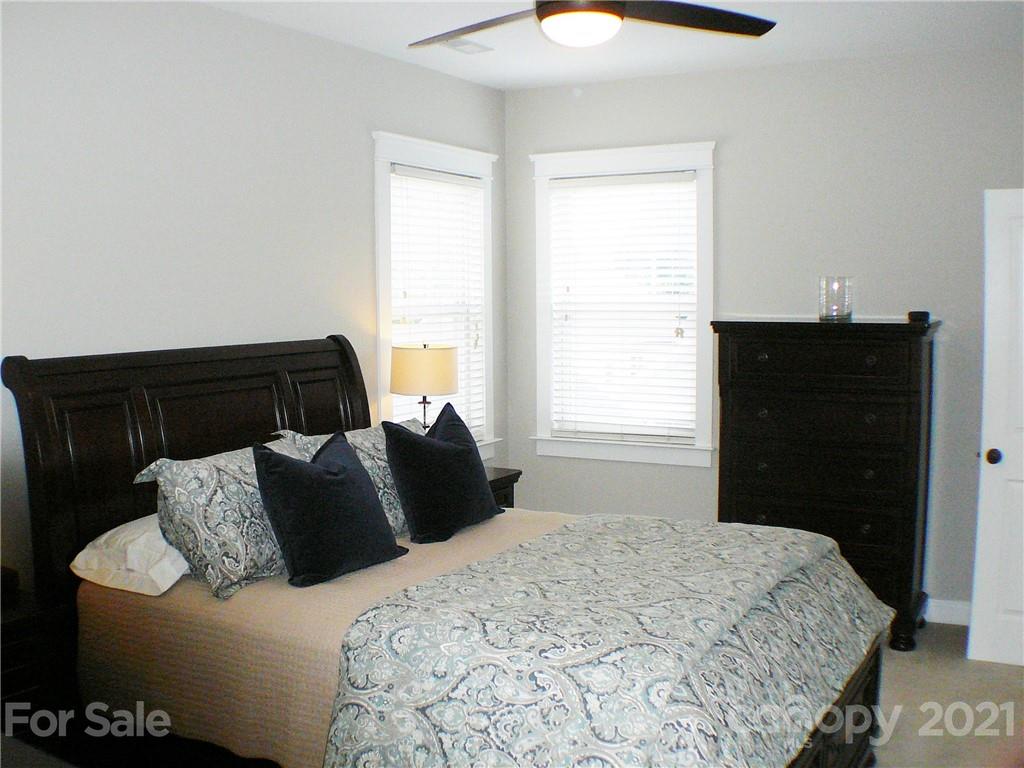 8111 Townley Road Huntersville, NC 28078 - Photo 15 of 27 a bedroom with bed and a window
