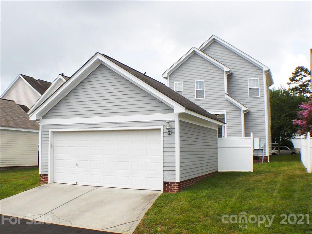 8111 Townley Road Huntersville, NC 28078 - Photo 23 of 27 a view of house with backyard