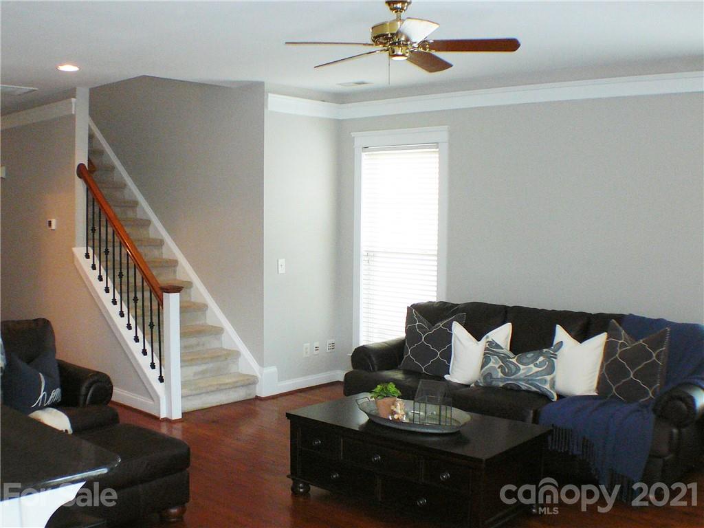 8111 Townley Road Huntersville, NC 28078 - Photo 5 of 27 a living room with furniture and wooden floor