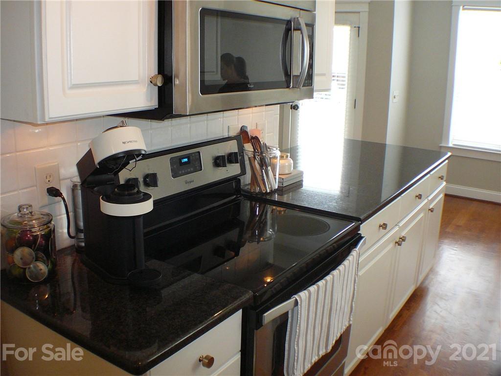 8111 Townley Road Huntersville, NC 28078 - Photo 9 of 27 a kitchen with sink and cabinets