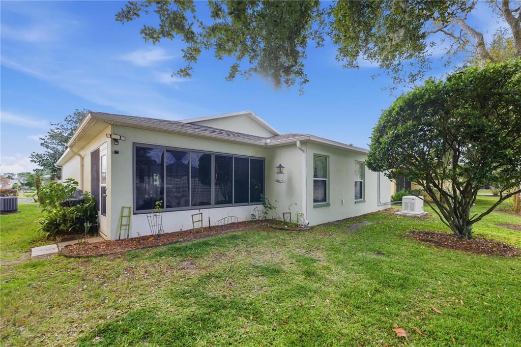 15771 Southwest 13th Circle Ocala, FL 34473 - Photo 24 of 29 a view of a house with a yard
