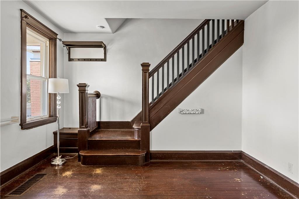 4048 Franklin Road Pittsburgh, PA 15214 - Photo 12 of 25 a hallway with stairs and a window