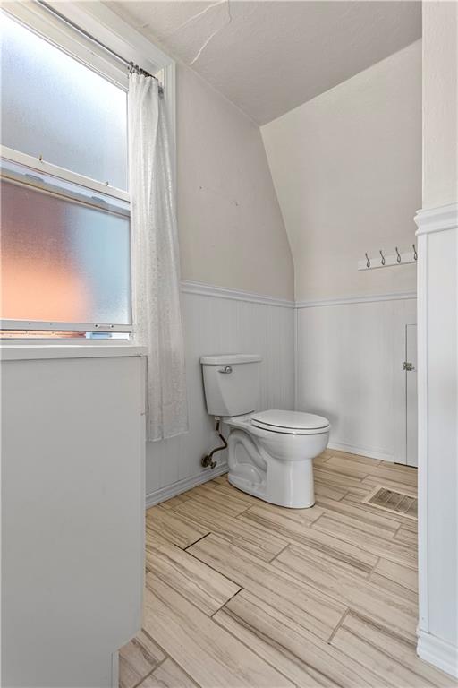 4048 Franklin Road Pittsburgh, PA 15214 - Photo 13 of 25 a bathroom with a toilet and a glass door shower
