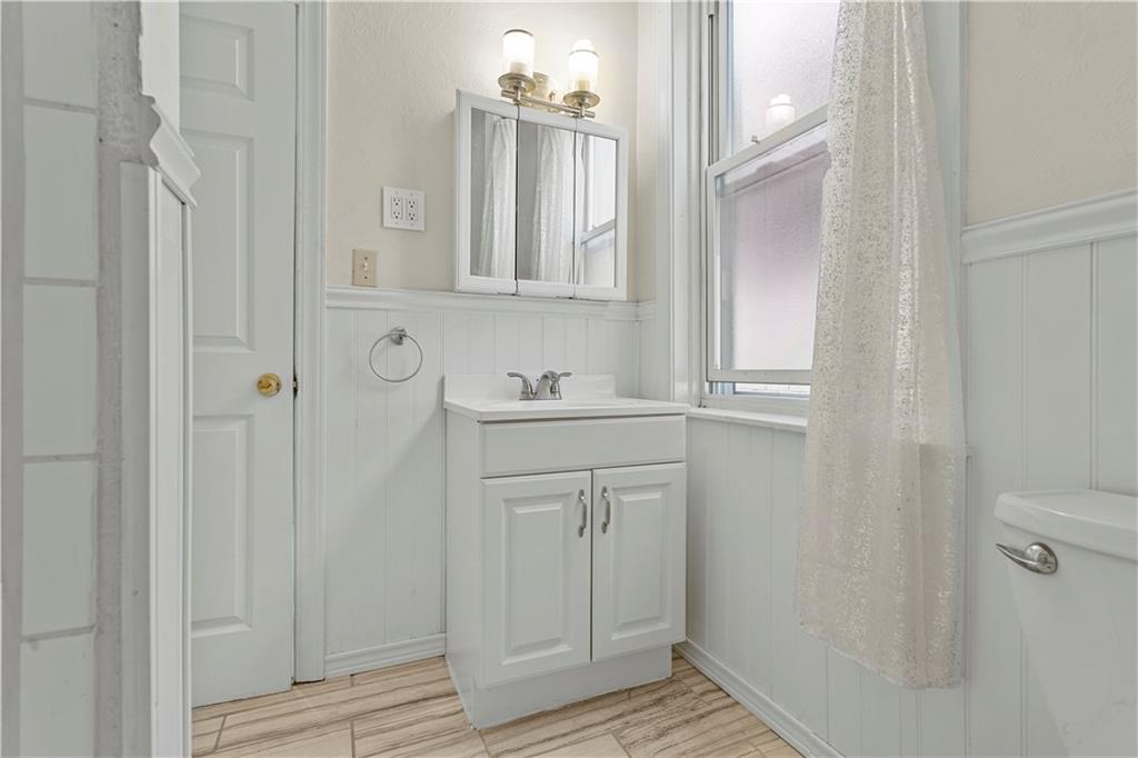 4048 Franklin Road Pittsburgh, PA 15214 - Photo 14 of 25 a bathroom with a sink and a mirror