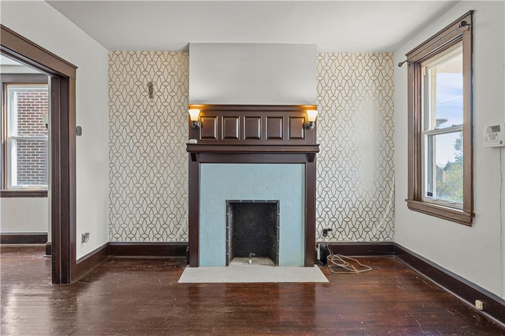 4048 Franklin Road Pittsburgh, PA 15214 - Photo 6 of 25 a living room with a fireplace