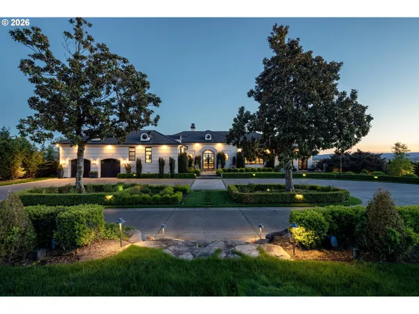 a view of house with swimming pool and outdoor space