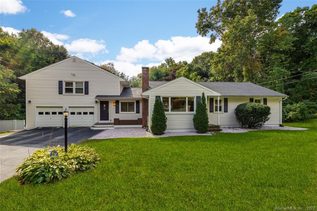26 Rutlee Drive Trumbull, CT 06611 - Photo 1 of 1 a front view of a house with a yard and porch