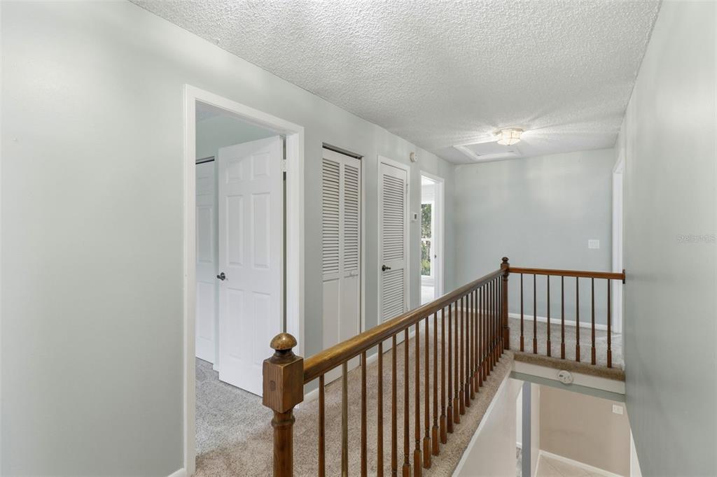 302 Bloomingfield Drive Brandon, FL 33511 - Photo 24 of 58 a view of a hallway with wooden floor and entryway