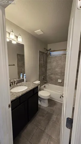 a view of a hallway with a window