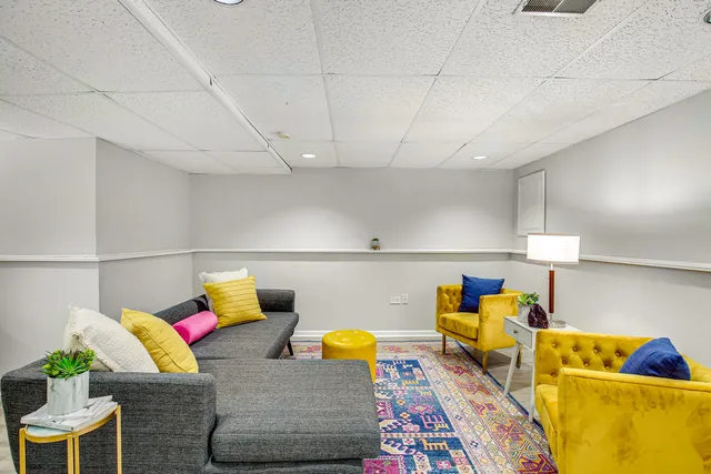 a living room with furniture and a couch