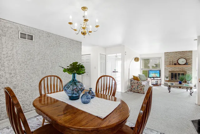 a view of a dining room with furniture