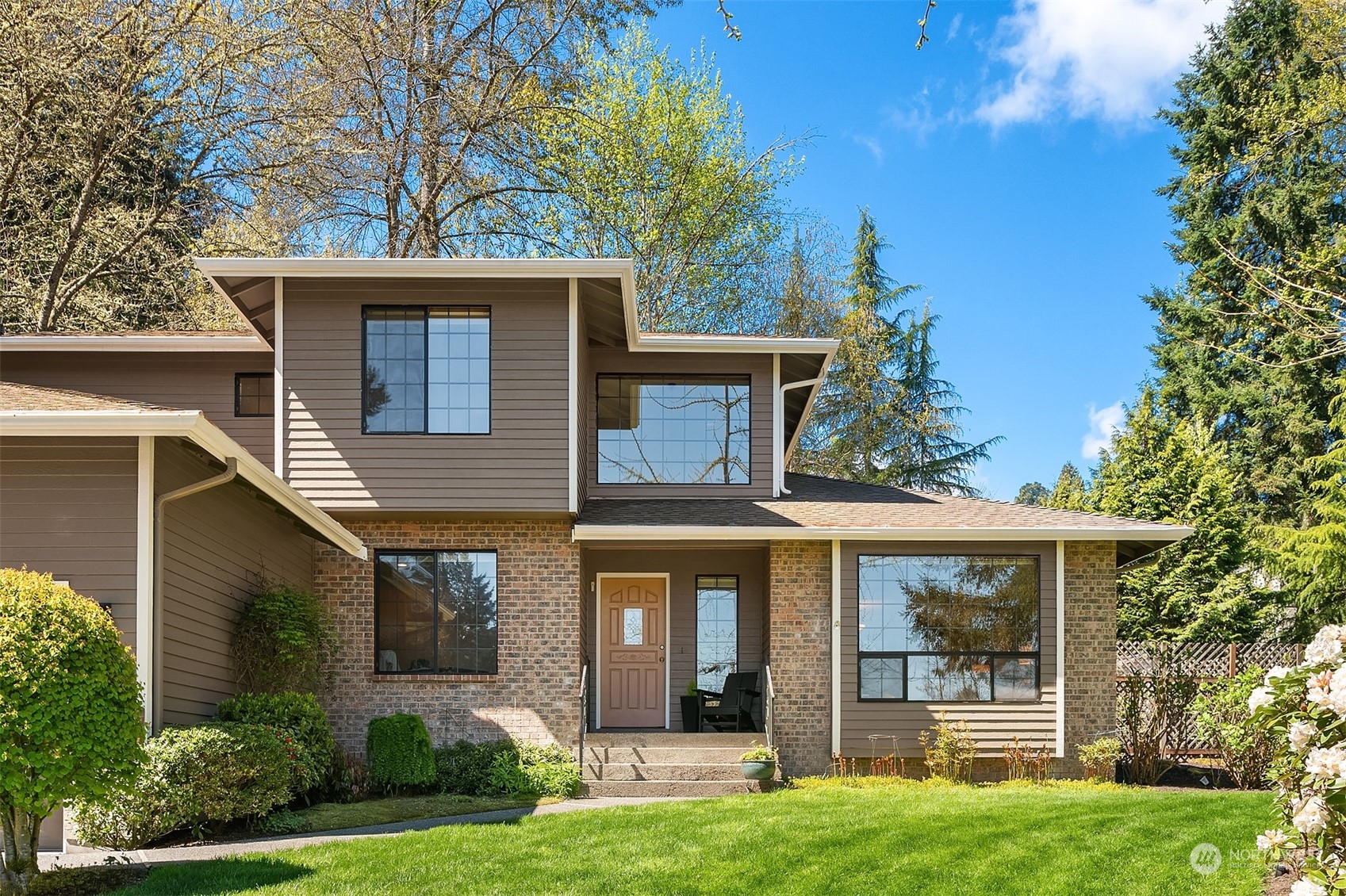 121 173rd Place Southeast Bothell, WA 98012 - Photo 2 of 39 front view of a house with a yard