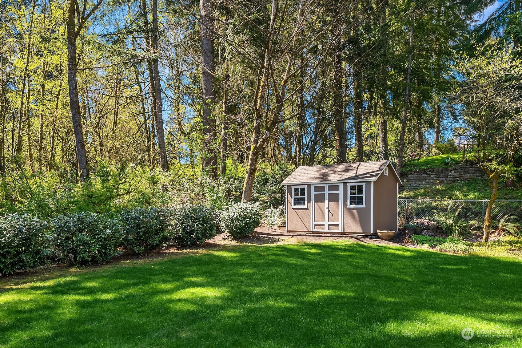 121 173rd Place Southeast Bothell, WA 98012 - Photo 36 of 39 a front view of a house with a yard and green space