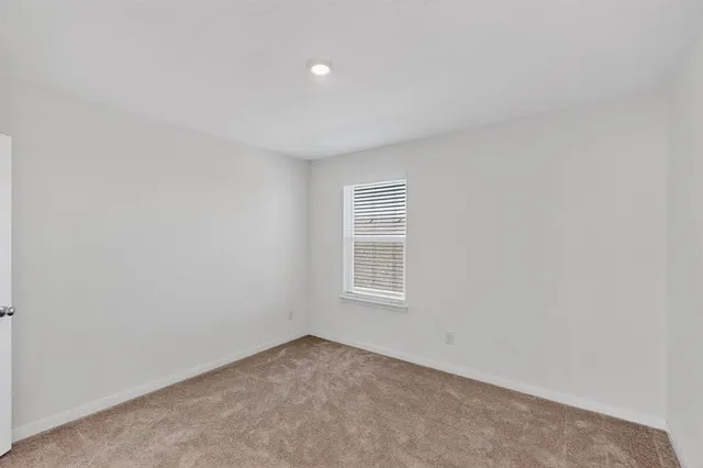 a bathroom with a sink toilet tub and shower