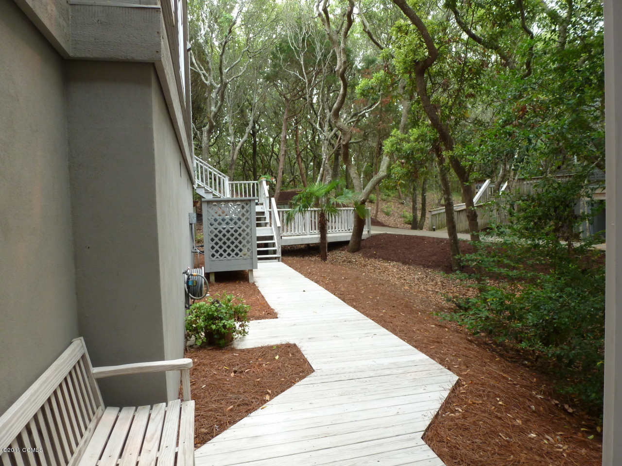 561 Coral Ridge Road Pine Knoll Shores, NC 28512 - Photo 12 of 46 Ground Level Exit to Back Yard and Beach