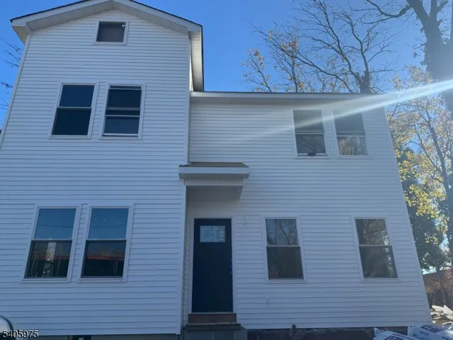 a view of front of house with stairs