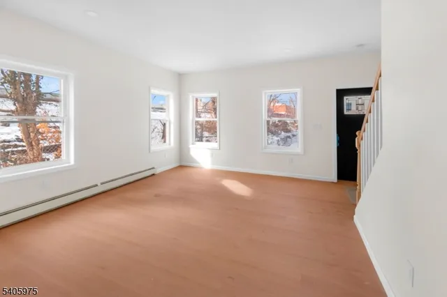 an empty room with windows