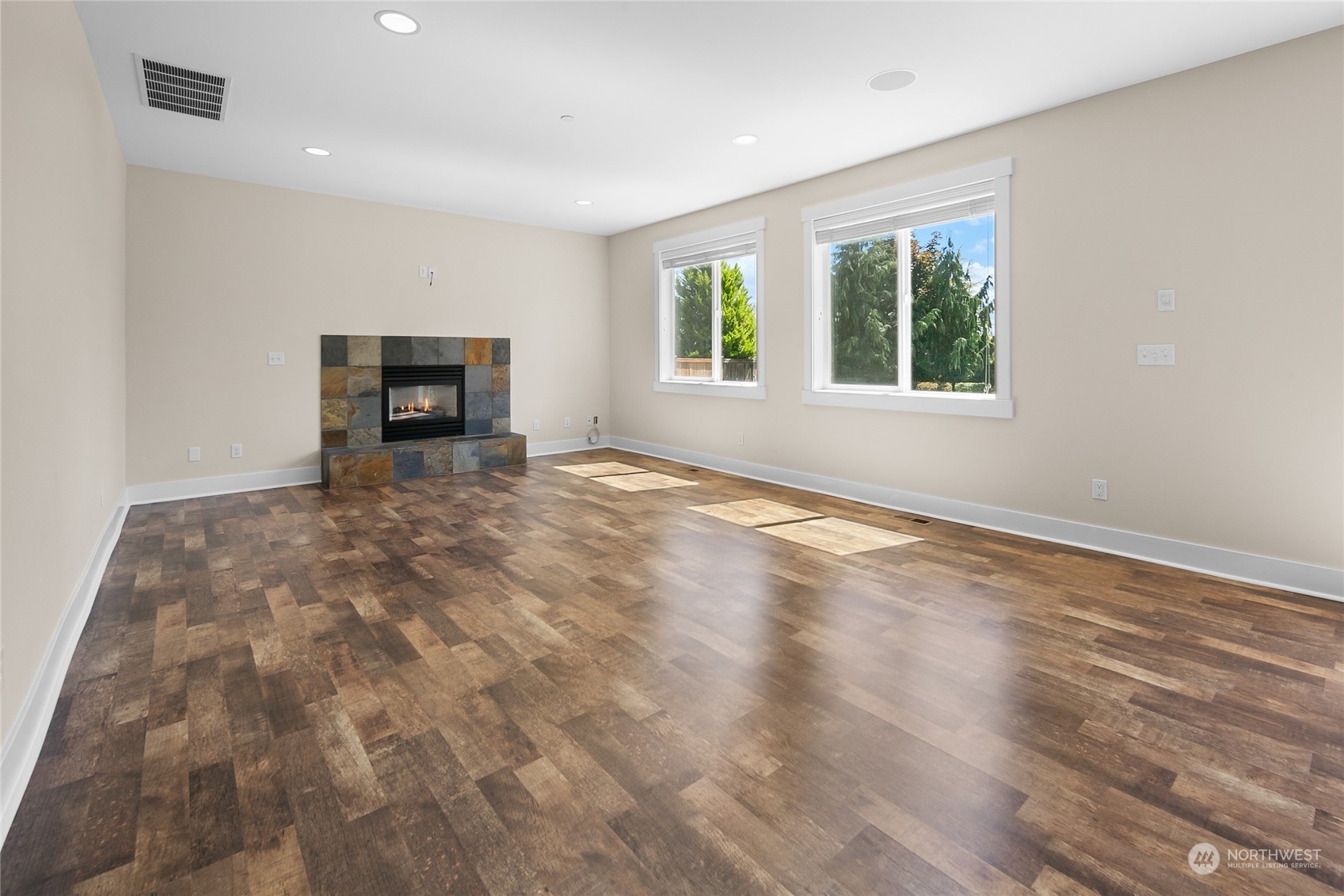 3110 216th Place Southeast Bothell, WA 98021 - Photo 13 of 37 a view of empty room with wooden floor and fan