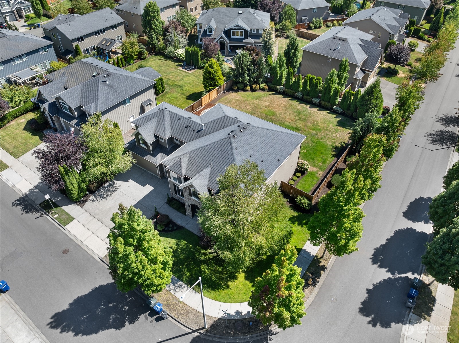 3110 216th Place Southeast Bothell, WA 98021 - Photo 2 of 37 an aerial view of multiple houses with yard