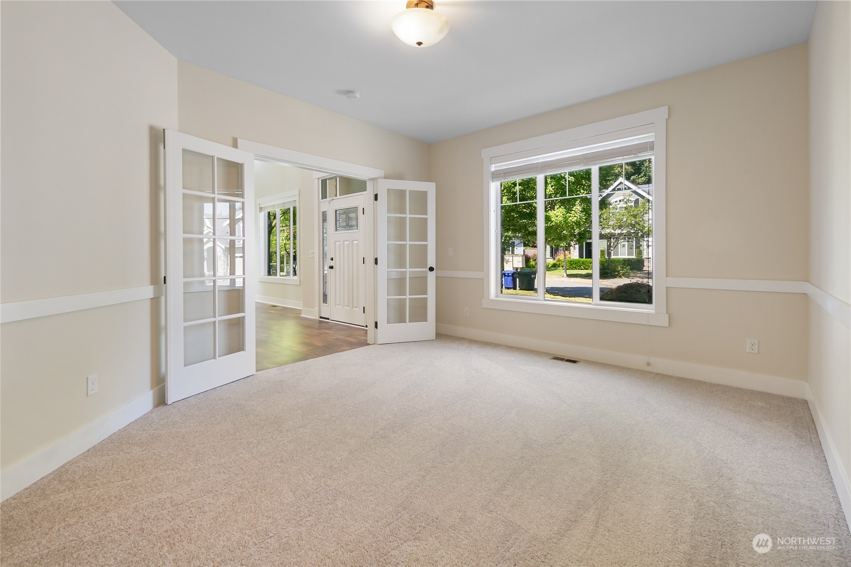 3110 216th Place Southeast Bothell, WA 98021 - Photo 21 of 37 an empty room with windows and view of kitchen