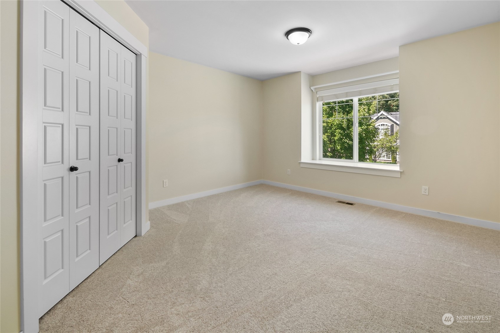 3110 216th Place Southeast Bothell, WA 98021 - Photo 23 of 37 an empty room with windows