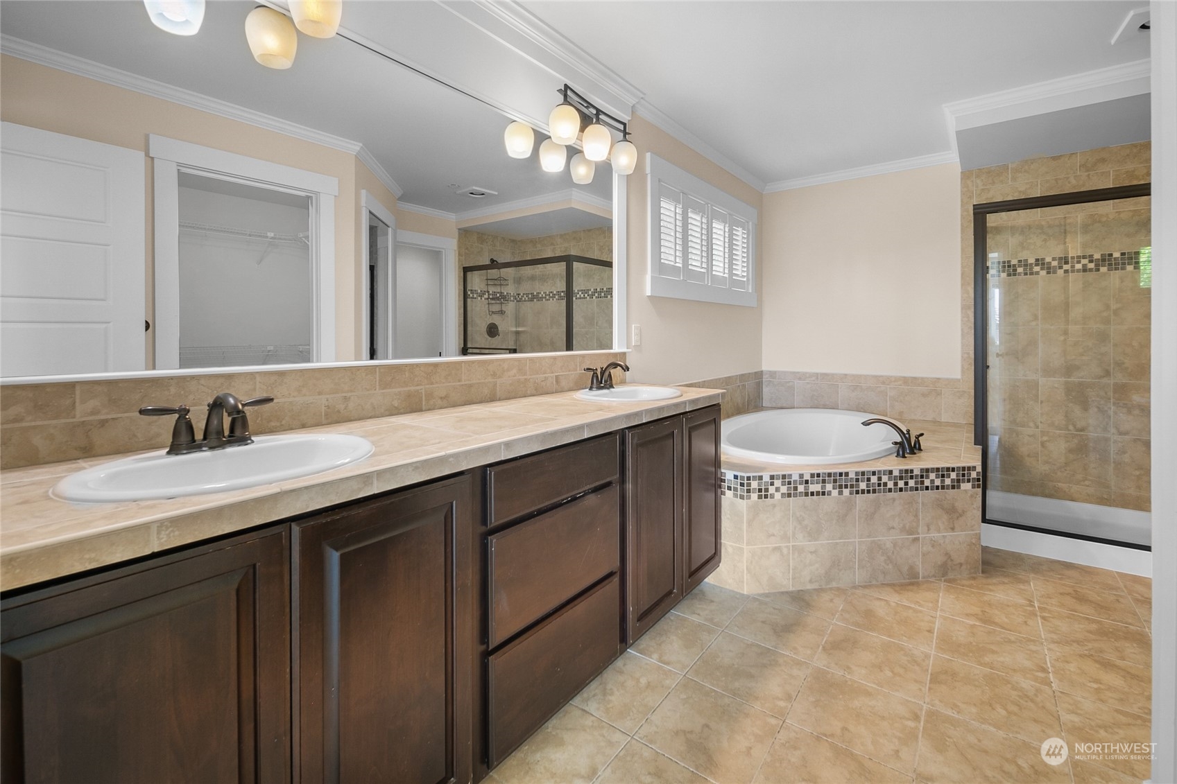 3110 216th Place Southeast Bothell, WA 98021 - Photo 27 of 37 a spacious bathroom with a sink a toilet and a mirror