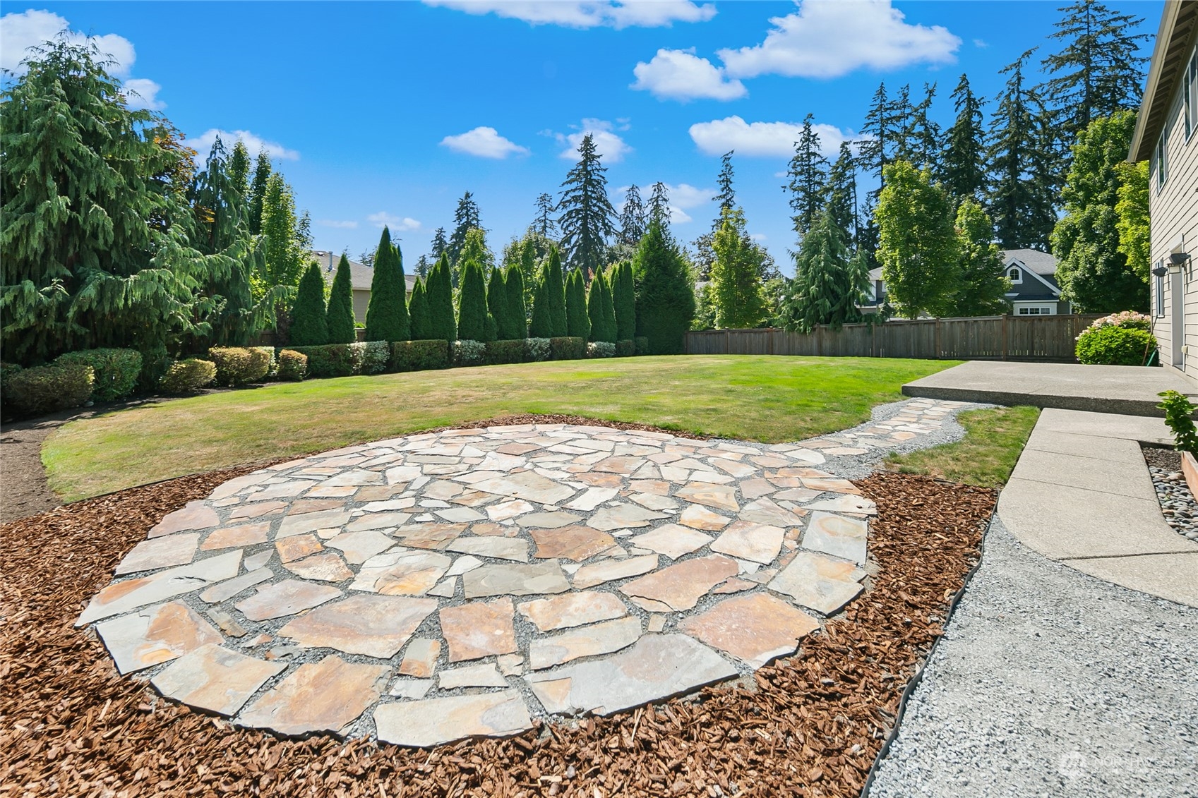 3110 216th Place Southeast Bothell, WA 98021 - Photo 36 of 37 a view of a swimming pool with a yard