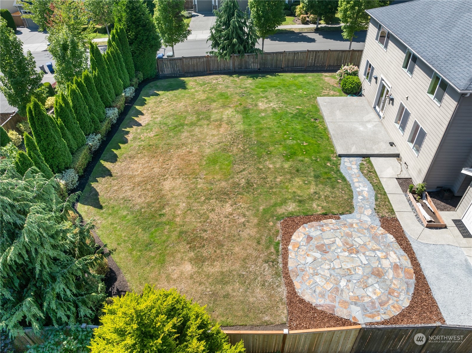 3110 216th Place Southeast Bothell, WA 98021 - Photo 7 of 37 a view of a backyard