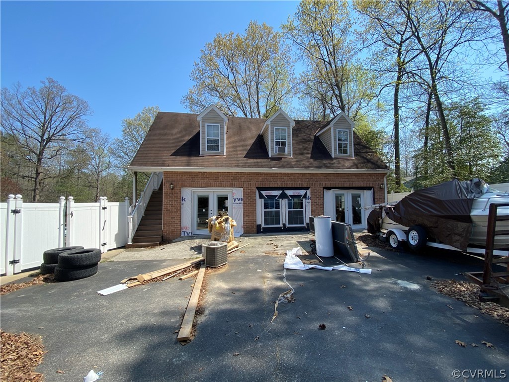 13221 Bailey Bridge Road Midlothian, VA 23112 - Photo 3 of 33 a view of a car park in front of house