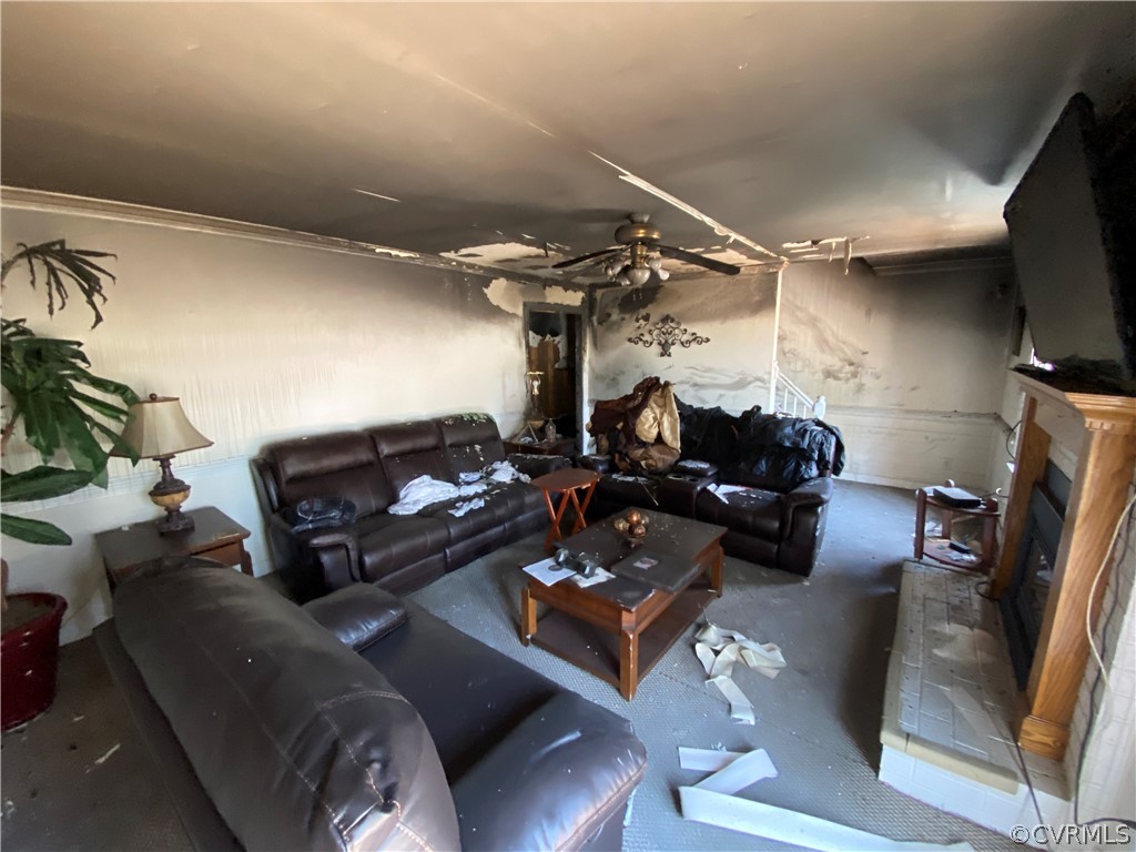 13221 Bailey Bridge Road Midlothian, VA 23112 - Photo 6 of 33 a living room with furniture and a flat screen tv