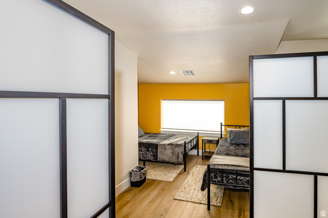 1283 North Gallen Road Santa Clara, UT 84765 - Photo 77 of 103 "Bedroom area" with recessed lighting, light wood-style flooring, and a textured ceiling