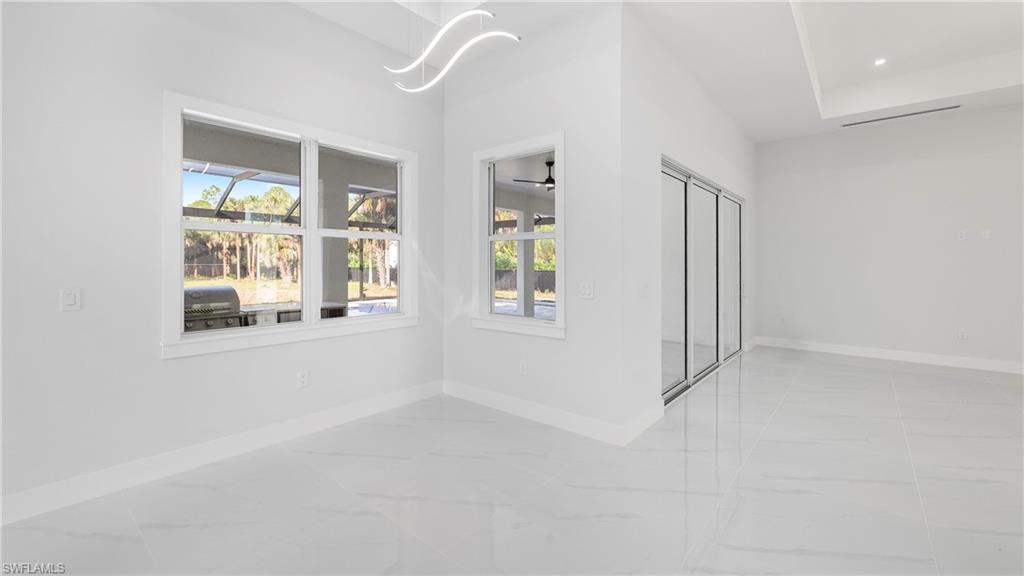 1687 19th Street Southwest Naples, FL 34117 - Photo 11 of 50 a view of an empty room with a window