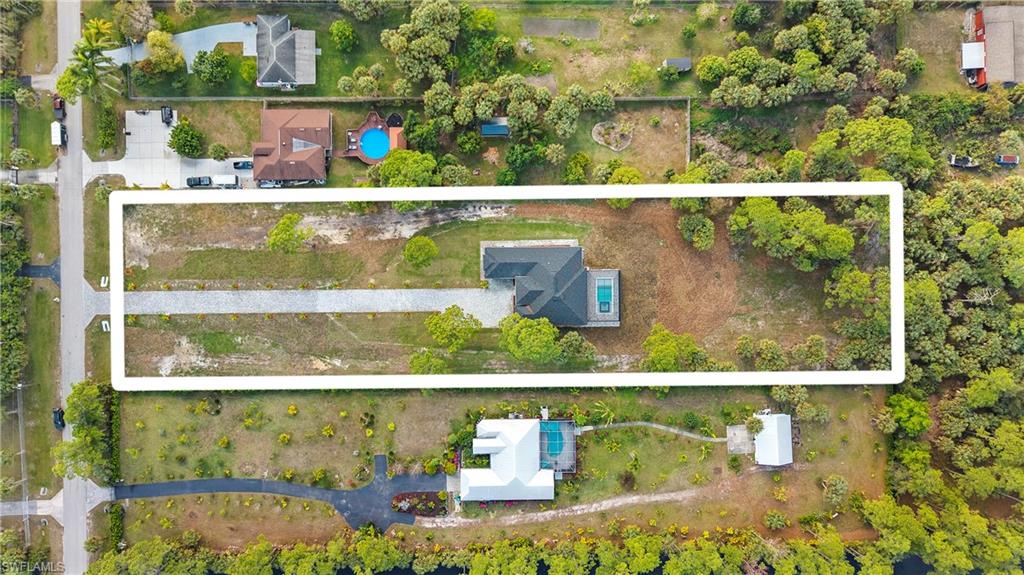 1687 19th Street Southwest Naples, FL 34117 - Photo 46 of 50 Aerial view of residential area