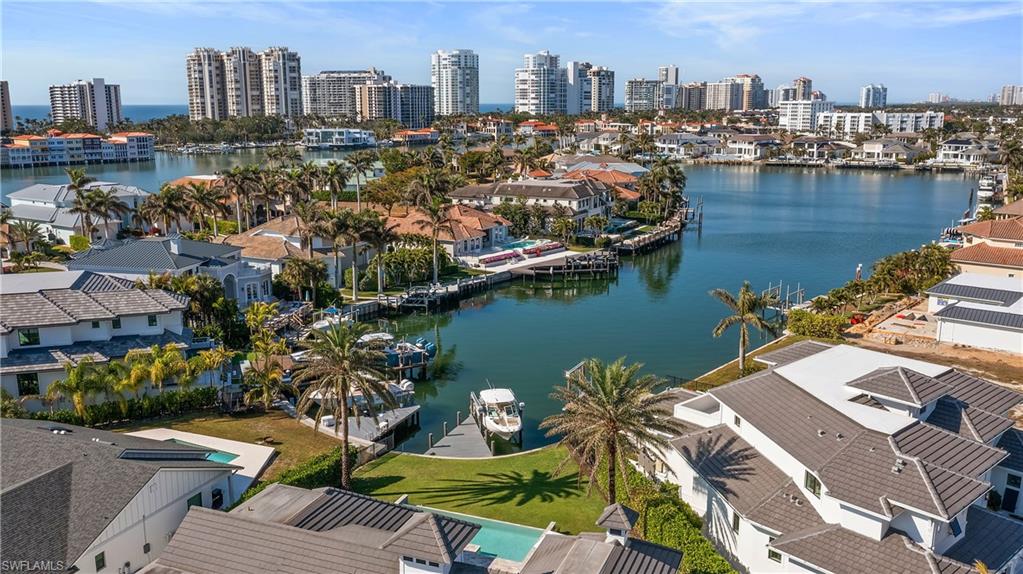 299 Mermaids Bight Naples, FL 34103 - Photo 24 of 28 a view of a city with an ocean