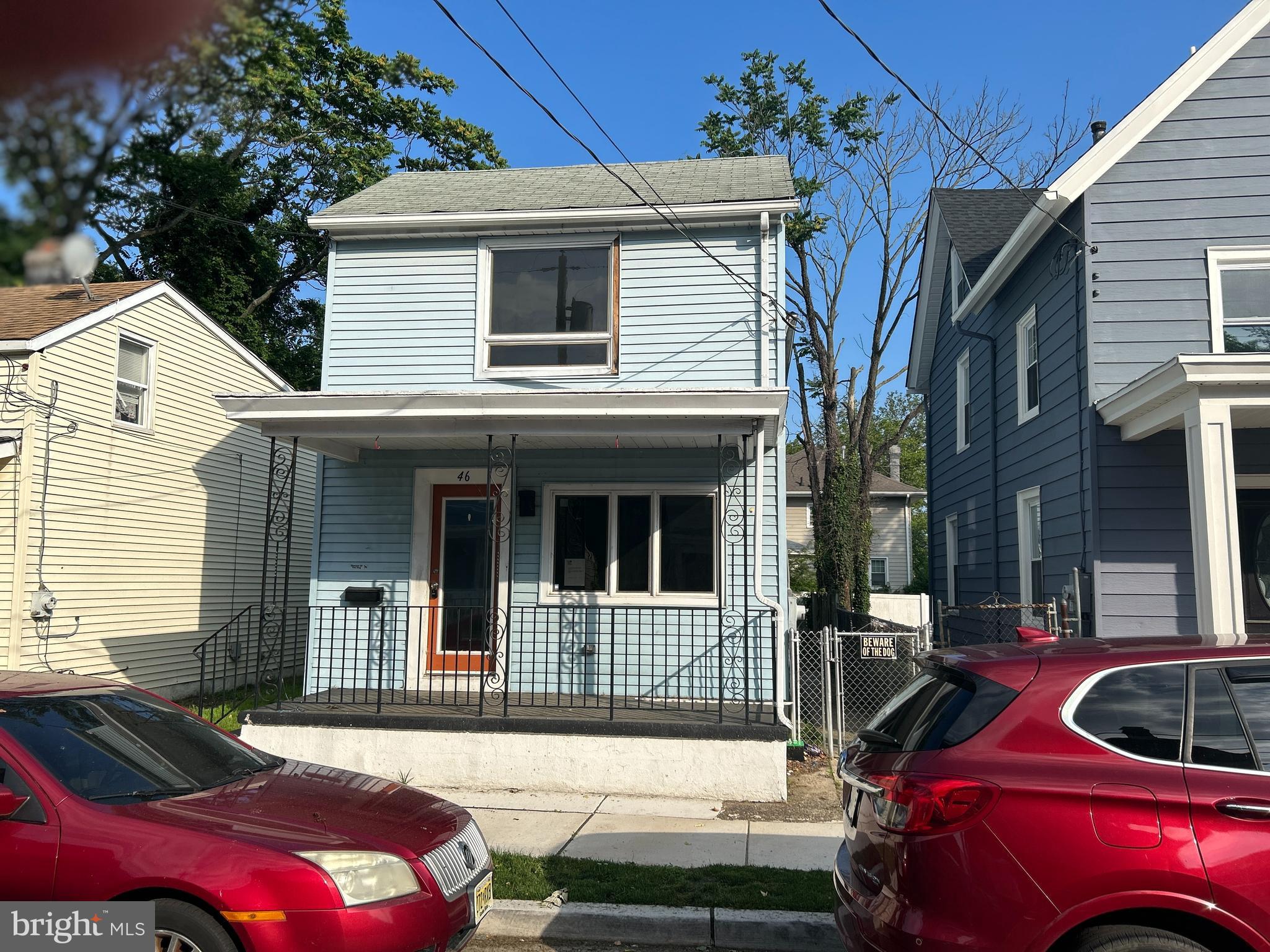 46 Penn Street Penns Grove, NJ 08069 - Photo 1 of 18 a front view of a house with a yard