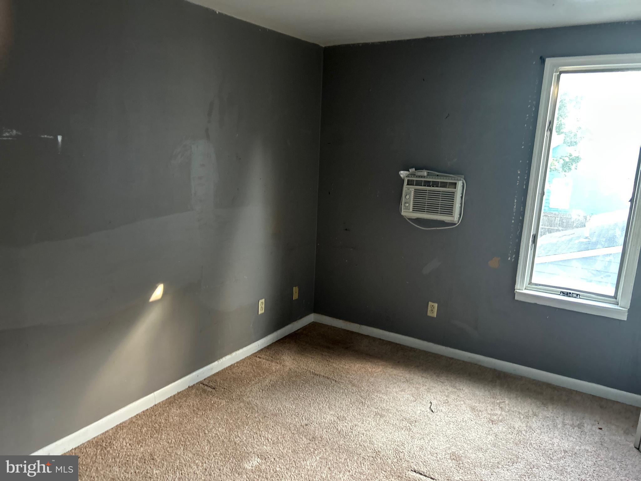 46 Penn Street Penns Grove, NJ 08069 - Photo 11 of 18 a view of an empty room with a window