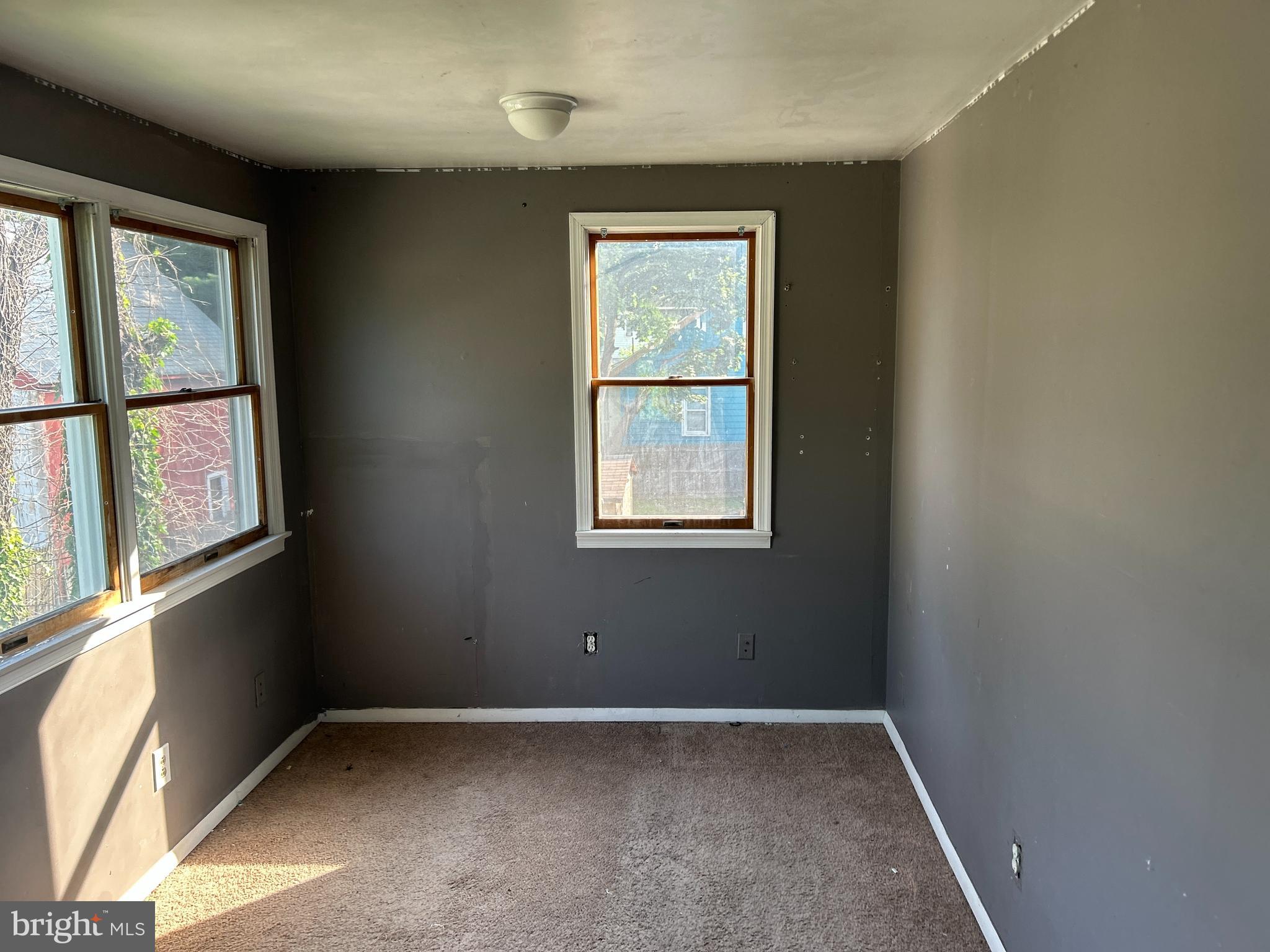 46 Penn Street Penns Grove, NJ 08069 - Photo 12 of 18 an empty room with windows