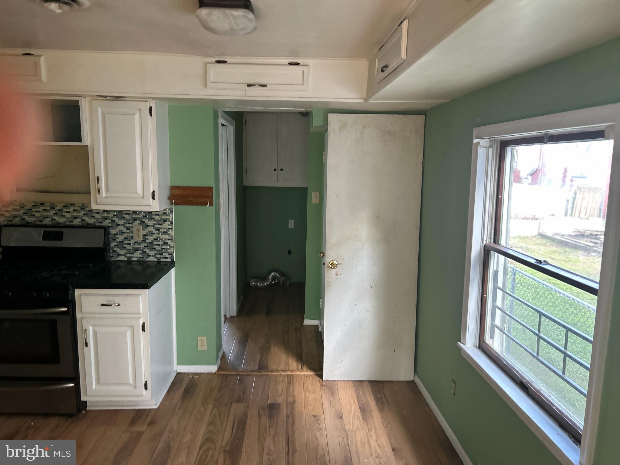46 Penn Street Penns Grove, NJ 08069 - Photo 3 of 18 a bathroom with a sink and a mirror