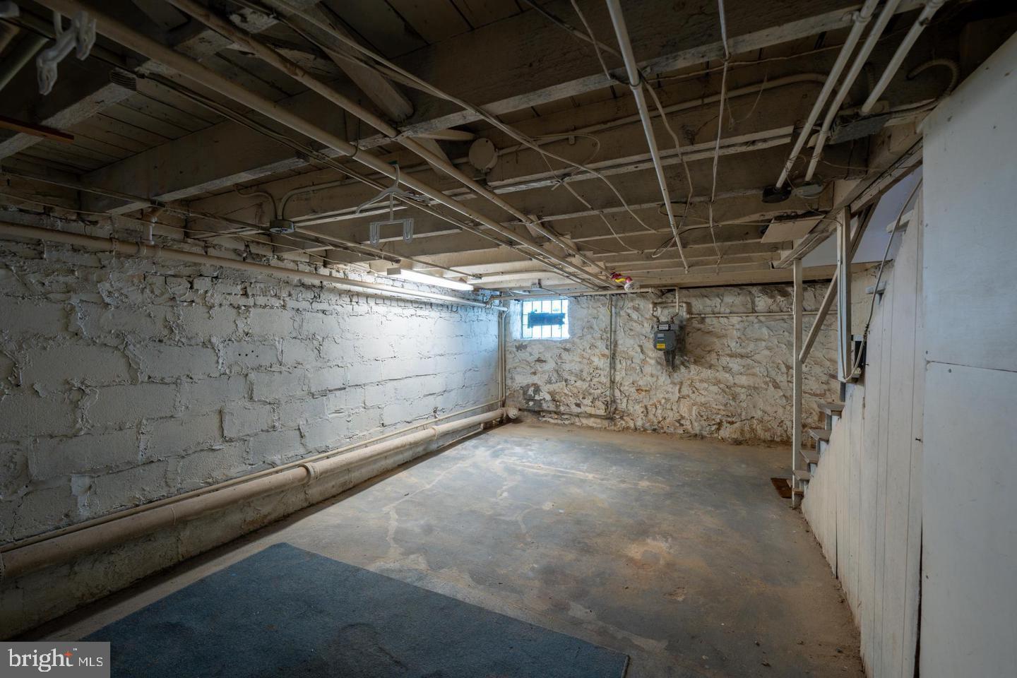 1637 Spence Street Baltimore, MD 21230 - Photo 18 of 22 a view of empty room with wooden walls