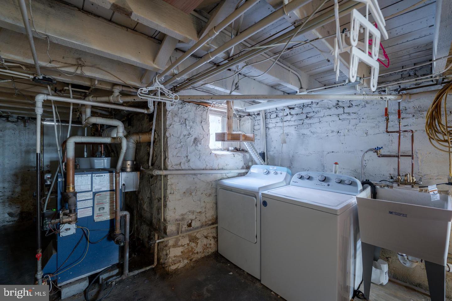 1637 Spence Street Baltimore, MD 21230 - Photo 20 of 22 a utility room with dryer and washer