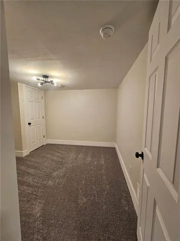 a view of a room with an empty space