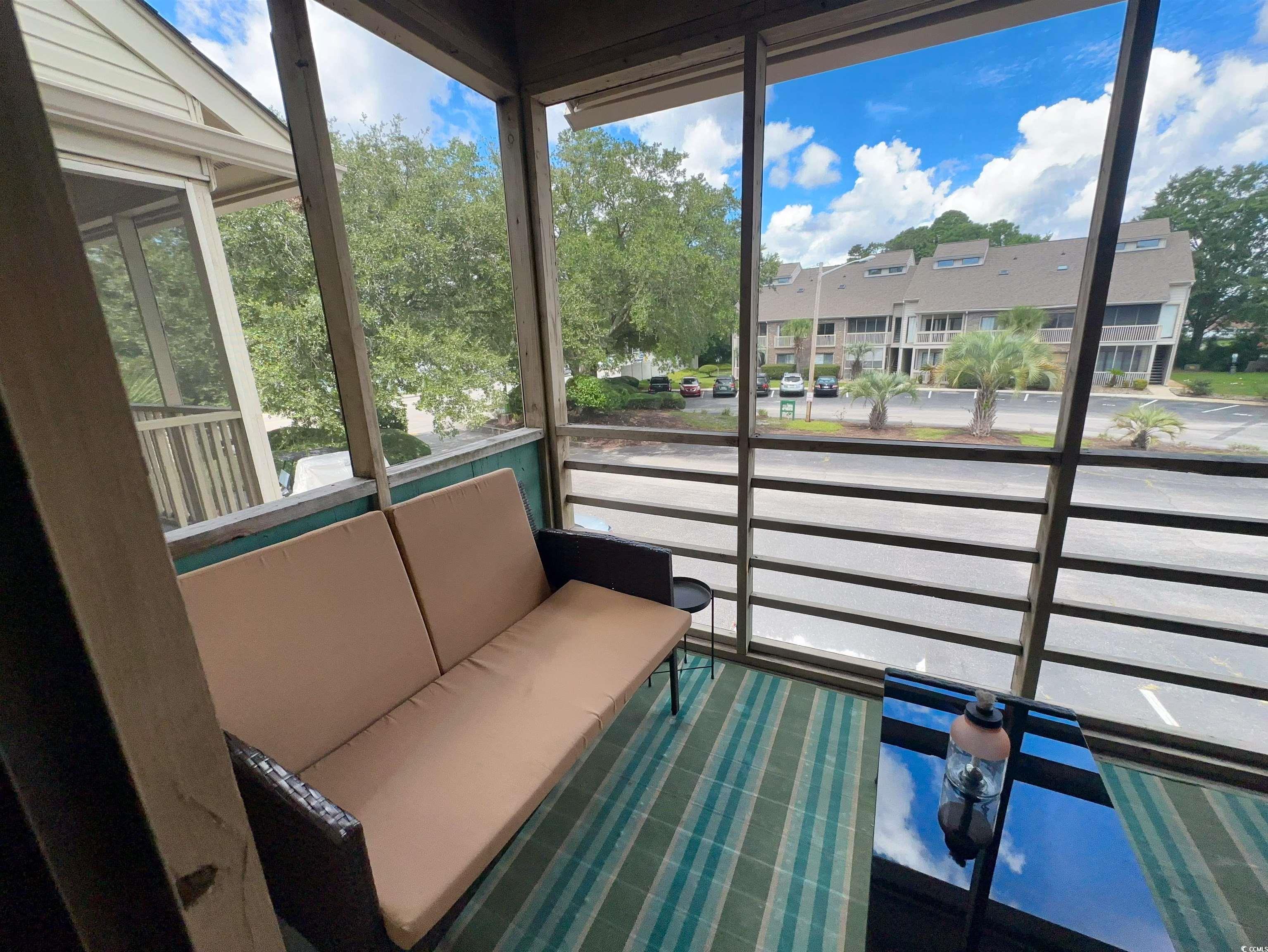 1356 Glenns Bay Road, Unit C202 Surfside Beach, SC 29575 - Photo 29 of 35 View of sunroom