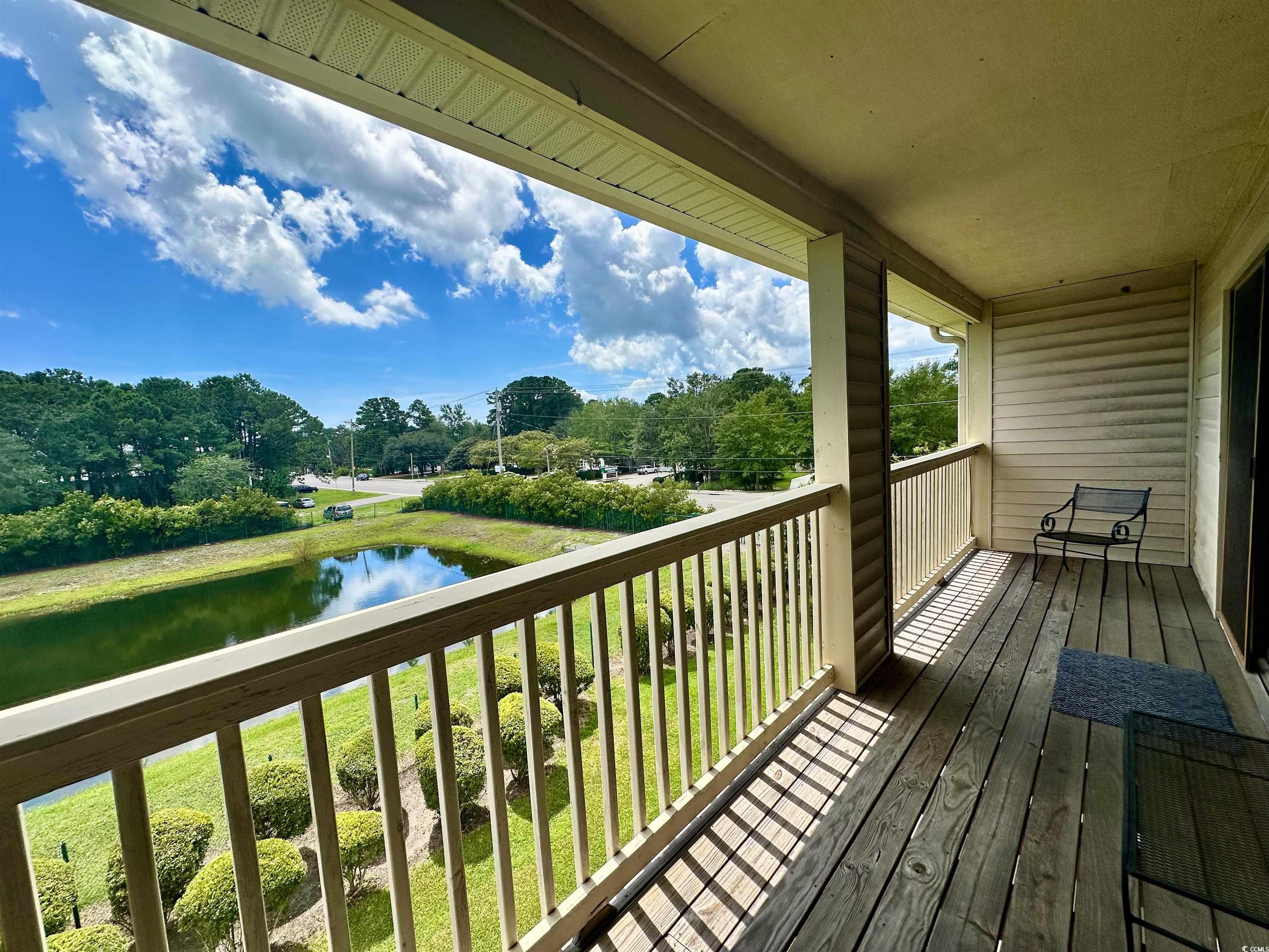 1356 Glenns Bay Road, Unit C202 Surfside Beach, SC 29575 - Photo 31 of 35 Sunroom featuring lofted ceiling