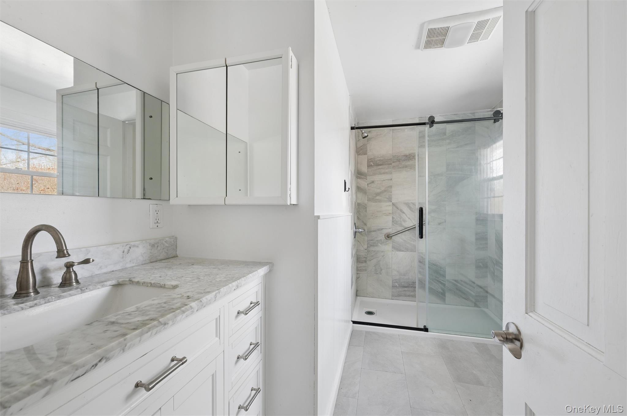 29 Squiretown Road, Unit D Hampton Bays, NY 11946 - Photo 14 of 26 Renovated Bathroom