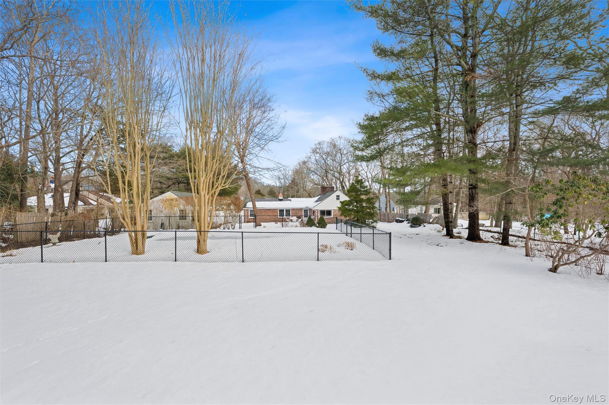 29 Squiretown Road, Unit D Hampton Bays, NY 11946 - Photo 25 of 26 Full Expanse of Backyard